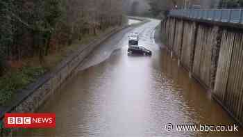 Firefighters rescue people from cars in Dolgellau floodwater