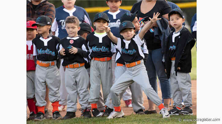 Young ballplayers swing for the fences