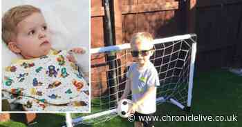 Adorable boy, 4, with rare blood disorder gifted his own special football pitch in the back garden
