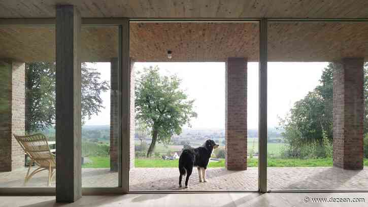 Studio Okami Architecten hides Sloped Villa in a Belgian hillside