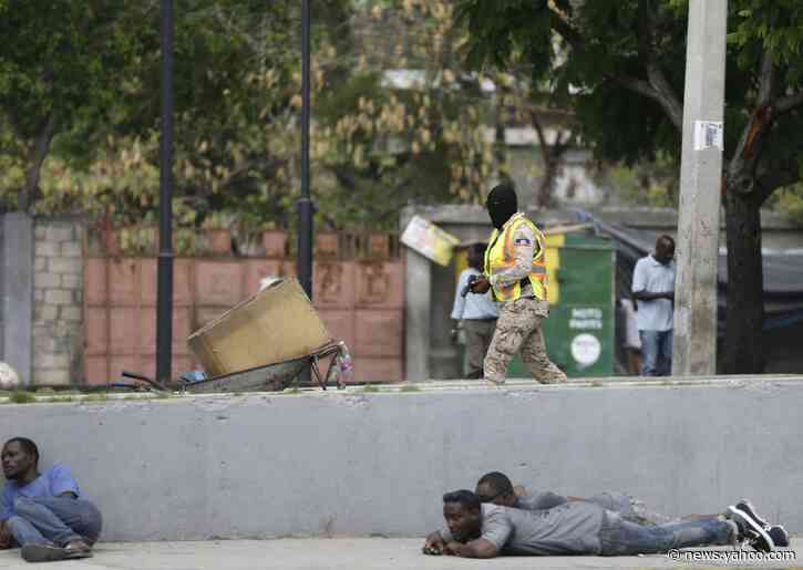 Haiti police exchange fire with troops near national palace