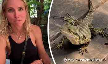 Chris Hemsworth and Elsa Pataky are joined by a lizard over breakfast - Daily Mail