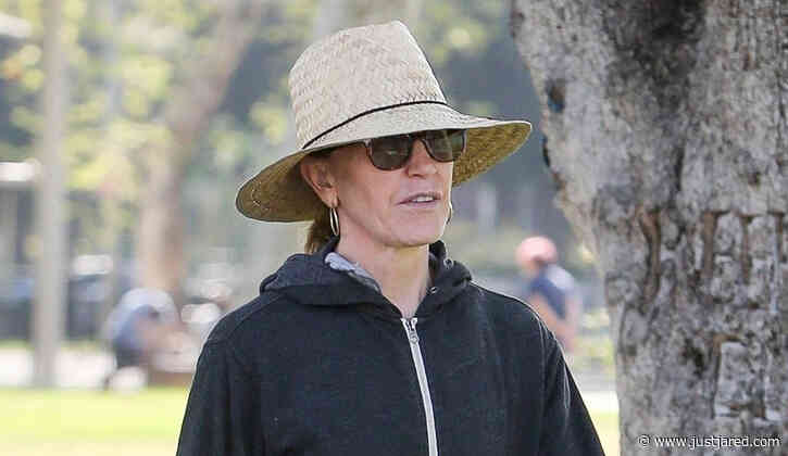 Felicity Huffman Keeps Low Profile Under Straw Hat While Working on Community Service Hours