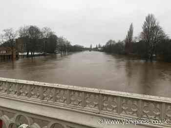 Snow falls in York as city braced for further flooding