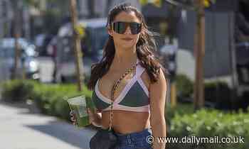 Demi Rose ensures all eyes are on her as she takes a stroll around Melrose Place