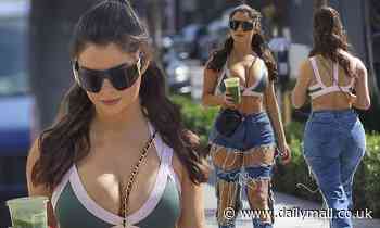 Demi Rose ensures all eyes are on her as she takes a stroll