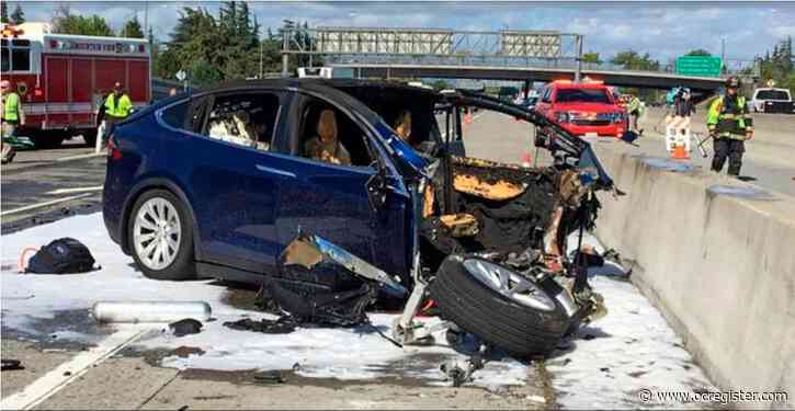 Driver in fatal Tesla crash was playing video game, NTSB says