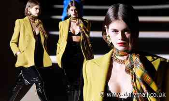 Kaia Gerber puts on a VERY busty display as she storms the runway for Saint Laurent show at PFW
