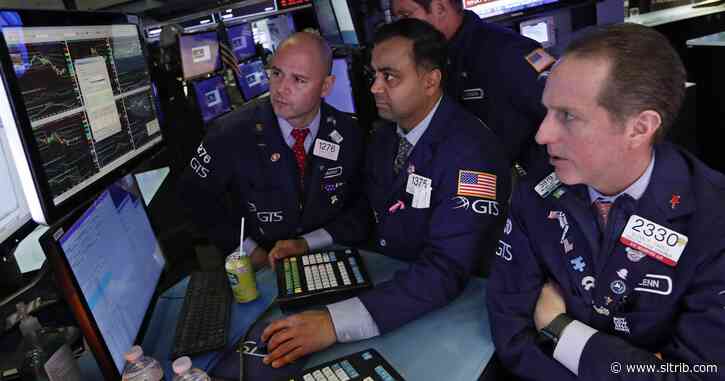 Stocks sink, bonds soar on fears virus will stunt economy