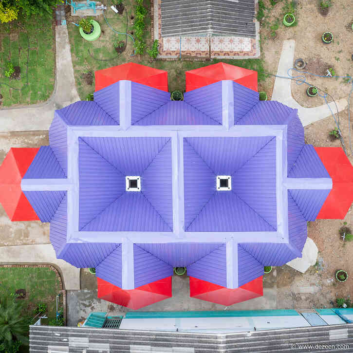 Brightly coloured classroom designed to harvest water in Thailand