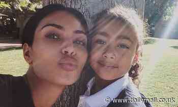 Kim Kardashian puckers up to daughter North as she drops the six-year-old off at school