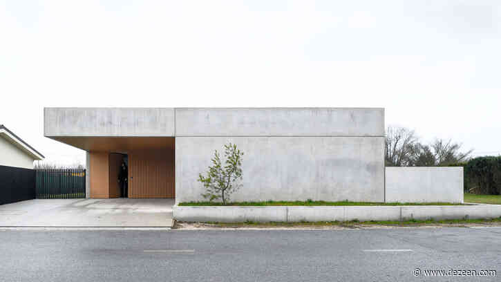 Concrete home in Slovenia combines living spaces with a ceramics studio
