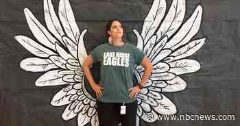 Lesbian teacher suspended for showing photo of 'future wife' gets $100,000 settlement