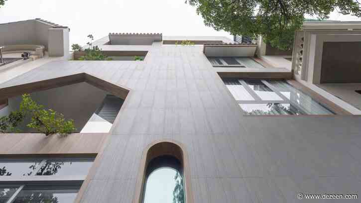 Compact house in Vietnam contains planted courtyards