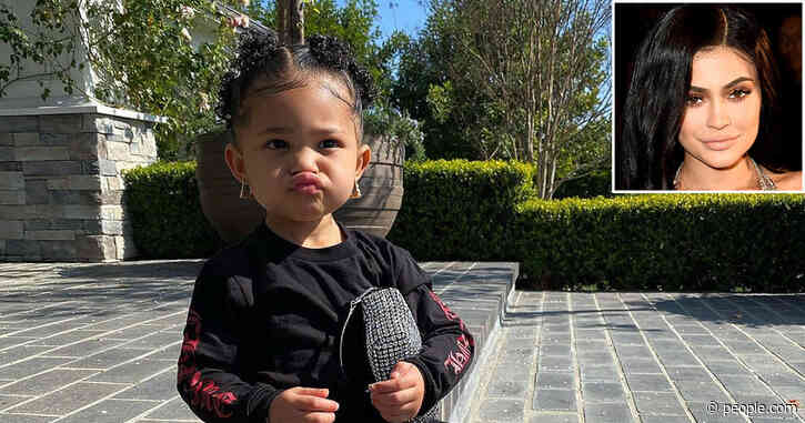 Kylie Jenner's Daughter Stormi, 2, Shows Off Her Style in Earrings, Sparkly Purse and Cell Phone