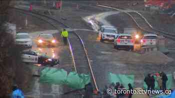 Four people charged in connection with blockade on Hamilton rail tracks