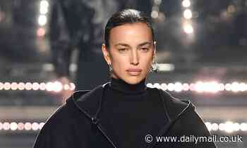 Irina Shayk struts down the catwalk with Gigi Hadid and Doutzen Kroes at Paris Fashion Week