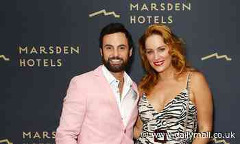 Jules Robinson flaunts her weight loss in a low-cut dress