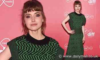 Imogen Poots puts on chic display in a emerald geometric print dress