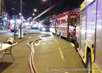 Nearly 100 firefighters tackle huge blaze at car workshop in Croydon