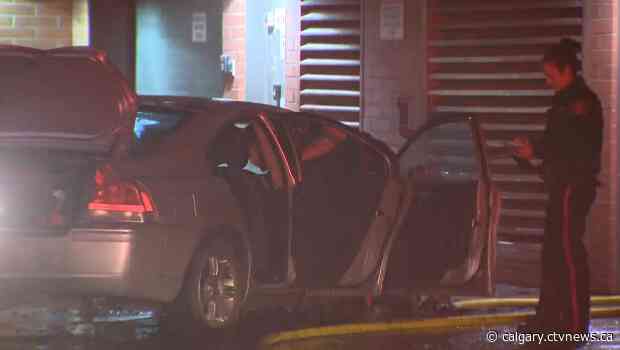 Man pulled from burning car in downtown alleyway
