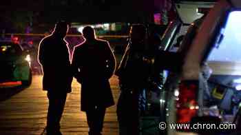 Family finds stranger shot to death in their living room in north Harris County