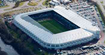 Off duty police officer caught making rude hand gestures at Swansea v Cardiff derby