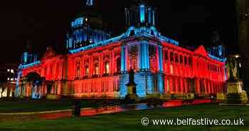 City hall lights up in West Belfast school colours for homelessness awareness - Belfast Live