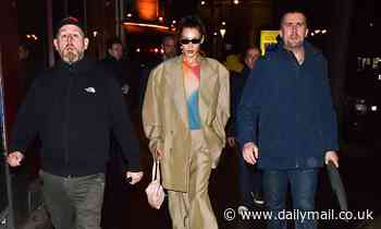 Bella Hadid joins sister Gigi and mum Yolanda for dinner as they're caught up in Paris protests