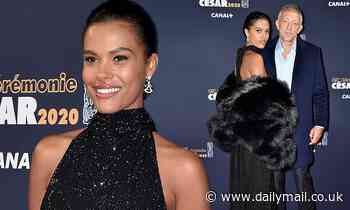 Tina Kunakey, 22, cosies up to husband Vincent Cassel, 53, at the 45th César Film Awards in Paris