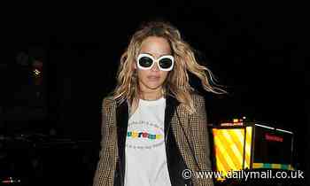 Rita Ora keeps it casual in tweed blazer, baggy jeans and kooky shades