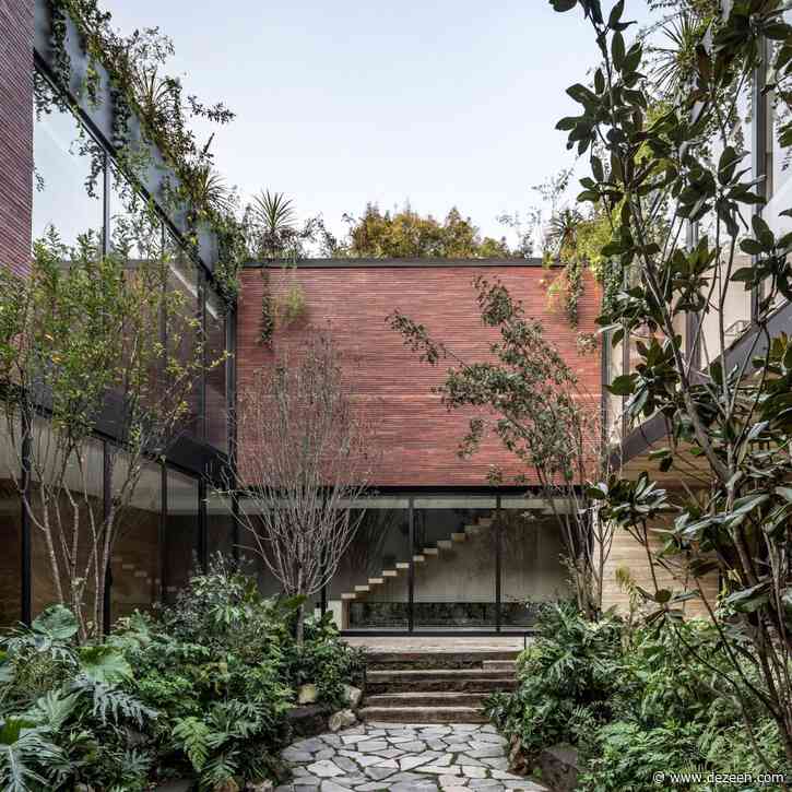 Monolithic brick volumes hide courtyard in Esrawe Studio's Casa Sierra Fría