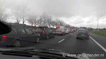 File door terugkerende vakantiegangers en kop-staartbotsing op A12
