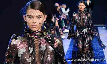 Georgia Fowler bares all in a sheer floral gown  at the Elie Saab runway show at Paris Fashion Week 