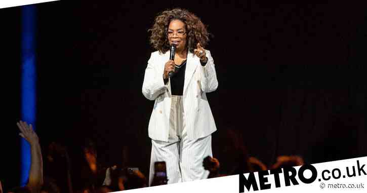 Oprah Winfrey takes a brutal tumble on stage during talk (which is ironically about balance)