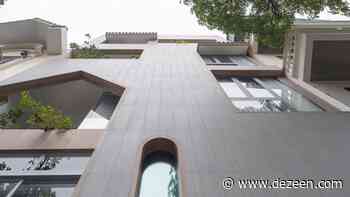 Landmak Architecture builds house in Vietnam with planted courtyards - Dezeen