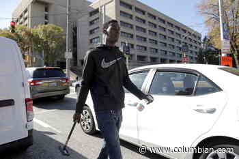 Squeegee kids find work, risks, cash at stoplights in Baltimore - The Columbian