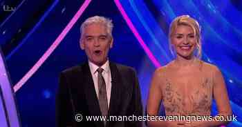 Holly Willoughby wolf-whistled as she presents Dancing On Ice in a nude dress