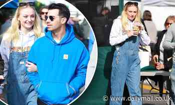 Sophie Turner shields stomach behind denim overalls while out with Joe Jonas amid pregnancy rumors