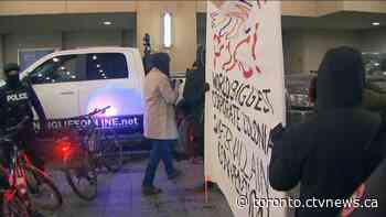 Front Street blocked as hundreds protest mining convention