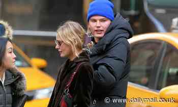 Jordan Barrett steps out with a female friend 