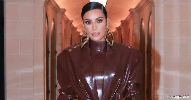 Kim Kardashian Debuts Not One, But Two 'Fresh Off the Runway' Balmain Latex Suits in Paris