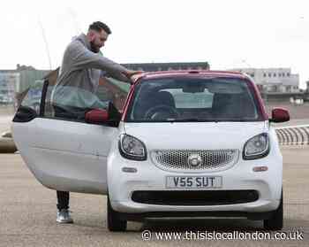 Ex-Wimbledon groundskeeper who stands at a staggering 7ft 1in drives around in a TINY smart car