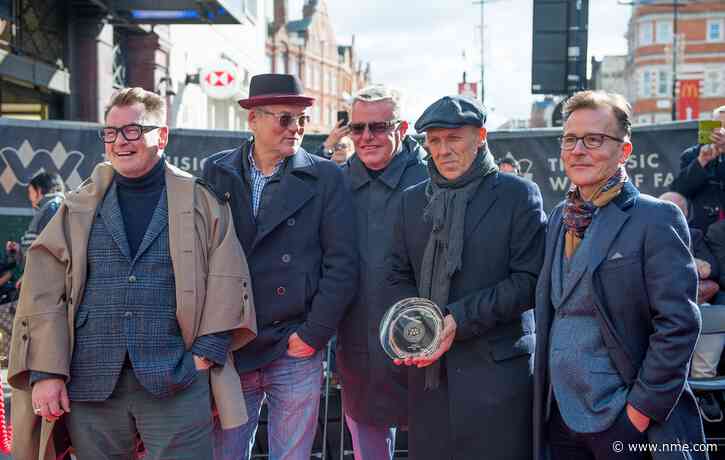 Madness unveil their stone on Camden’s Music Walk Of Fame