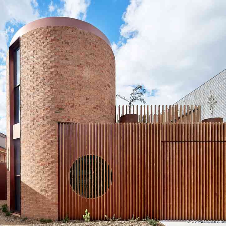 Brick and copper turrets define Melbourne house by Wowowa
