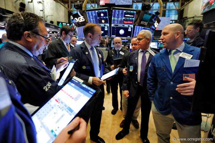 Stocks get a boost after Federal Reserve makes emergency rate cut