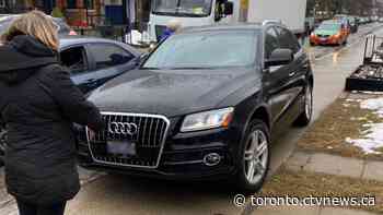 Audi SUV nearly hits pedestrians while mounting sidewalk to drive past garbage truck
