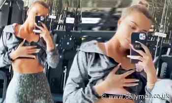 Khloe Kardashian shows off her toned tummy after another 6am workout session