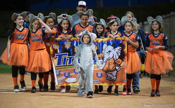 Irvine softball players have some fun before getting down to business