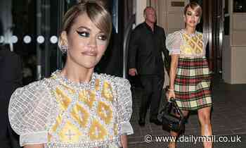 Rita Ora cuts an uncharacteristically demure during Paris Fashion Week
